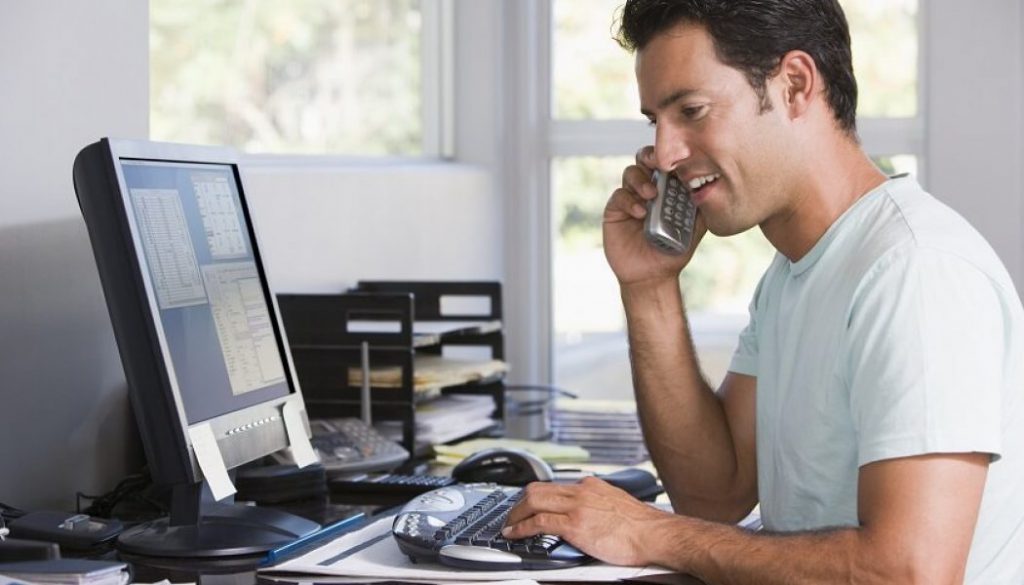 man working in home office